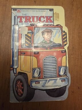Truck Book (Golden Sturdy Shape Book) by Golden Books (1984-08-04) Board book.